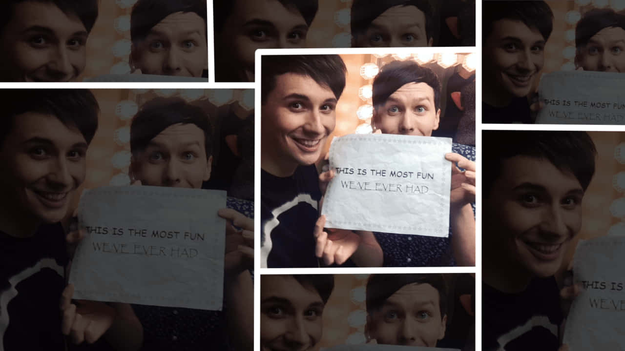 Dan And Phil Pose For The Camera Background