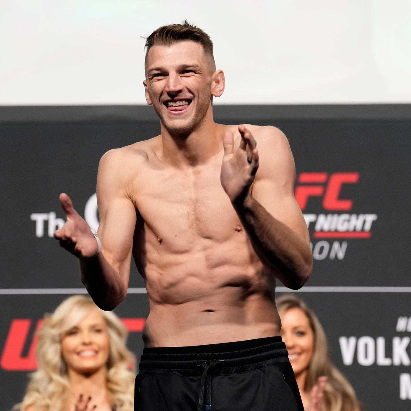 Dan Hooker Clapping While Smiling