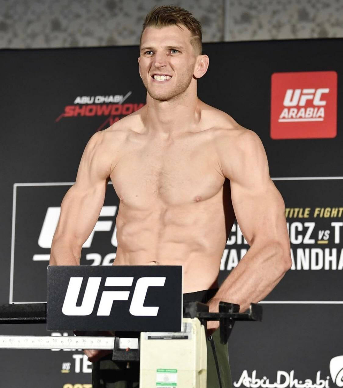 Dan Hooker Smiling On Scale