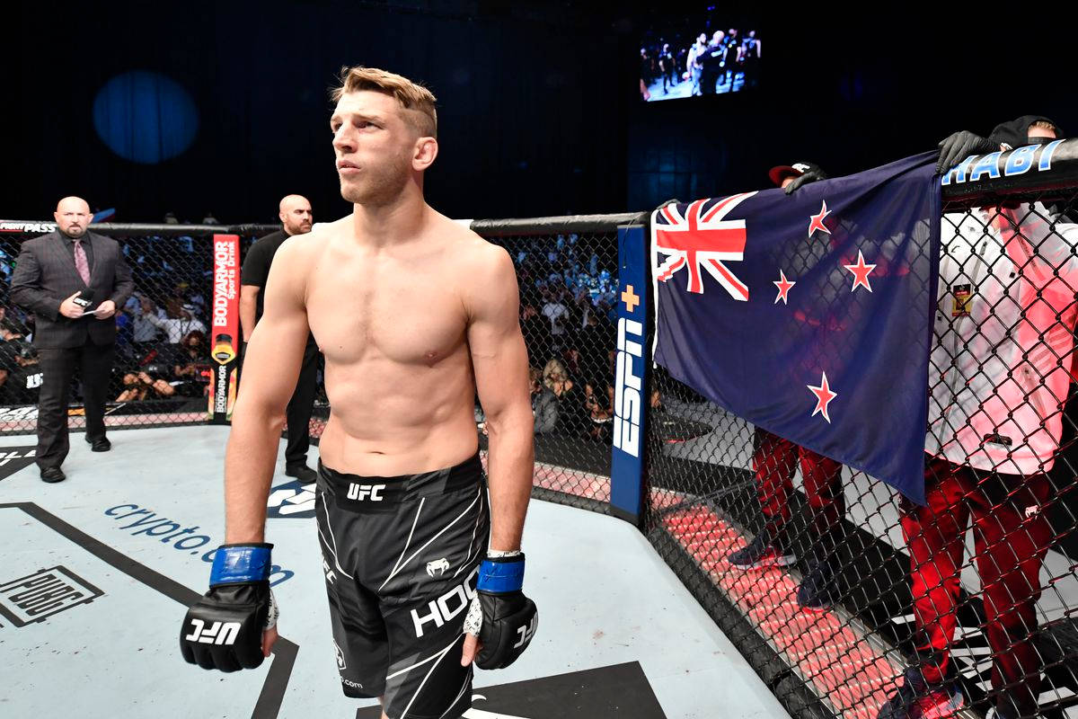 Dan Hooker With Nz Flag On Octagon