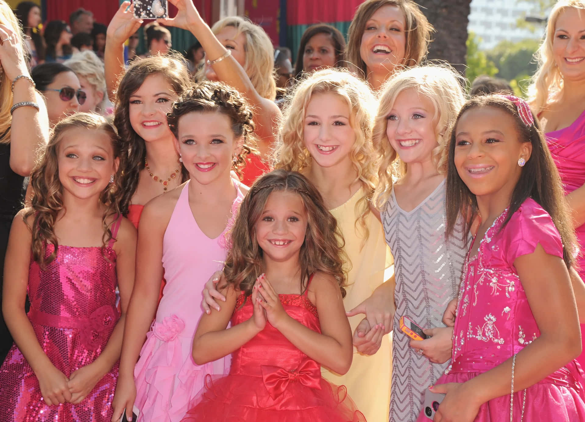 Dance_ Moms_ Cast_ Red_ Carpet_ Smiles Background