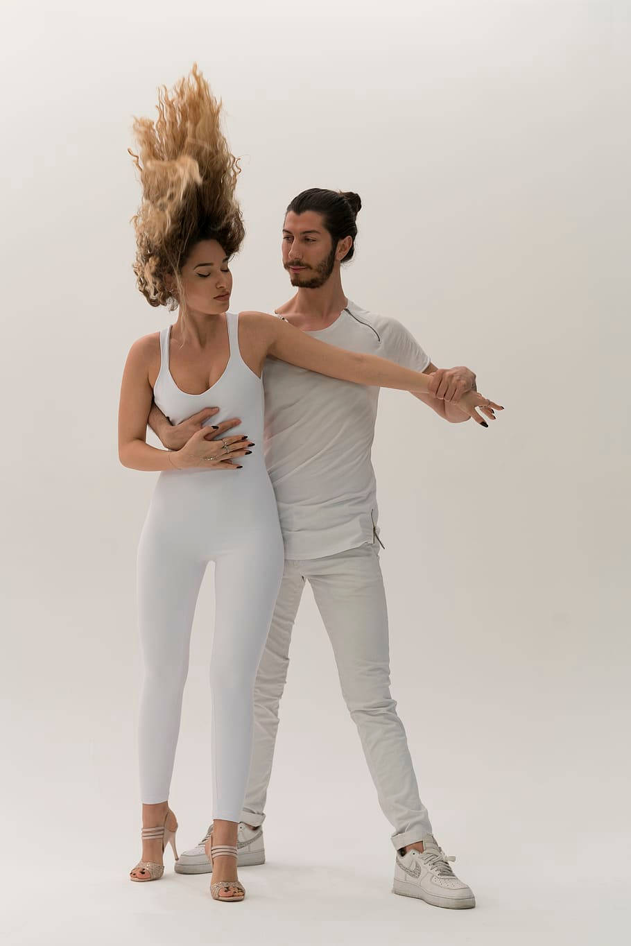 Dancing Couple In White Dance Pose Background