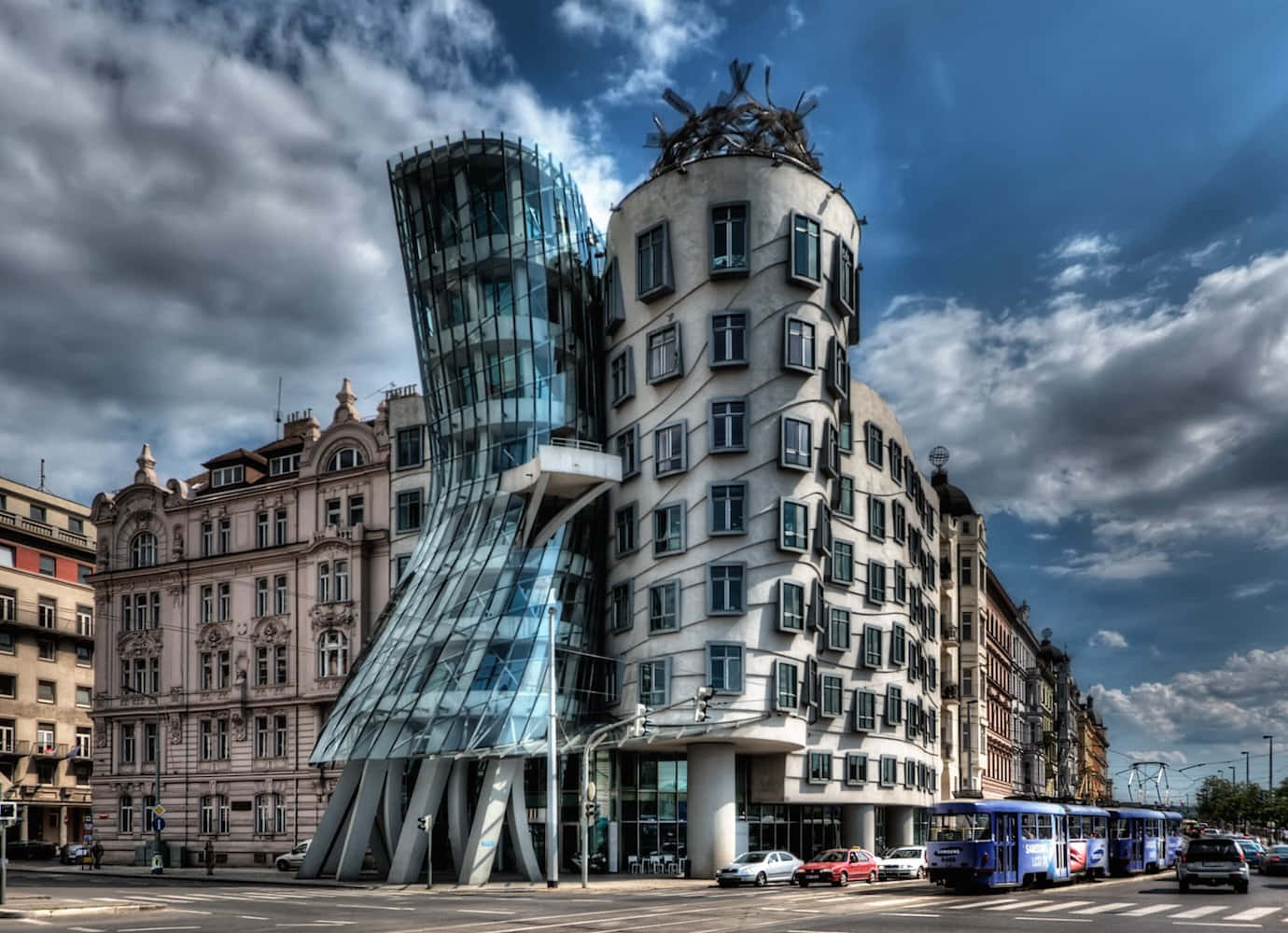 Dancing House Underneath Stormy Clouds Background