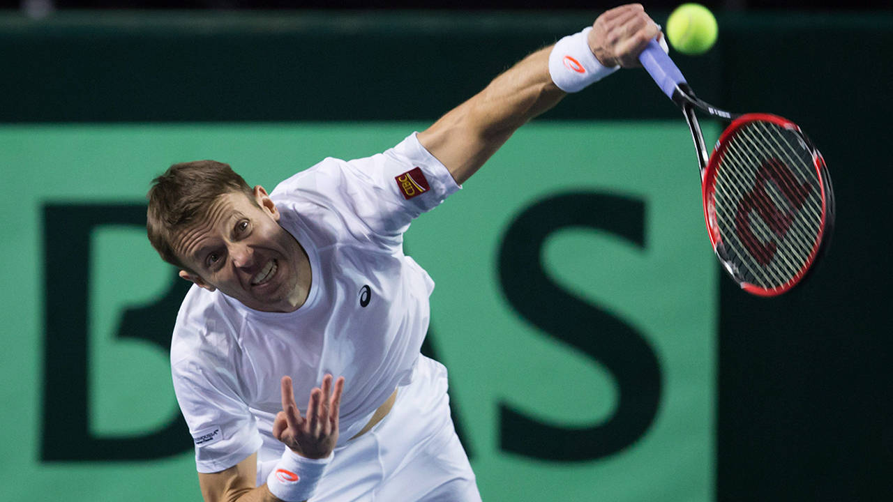 Daniel Nestor Glaring At Ball Background