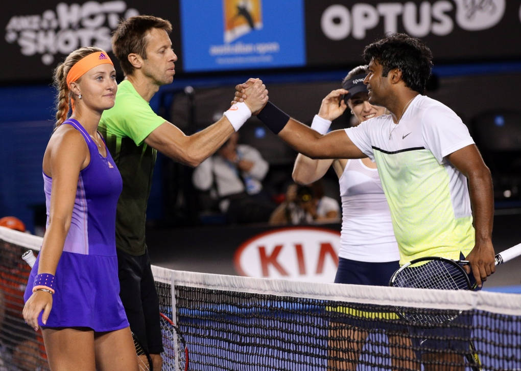 Daniel Nestor Interacting With His Tennis Opponents