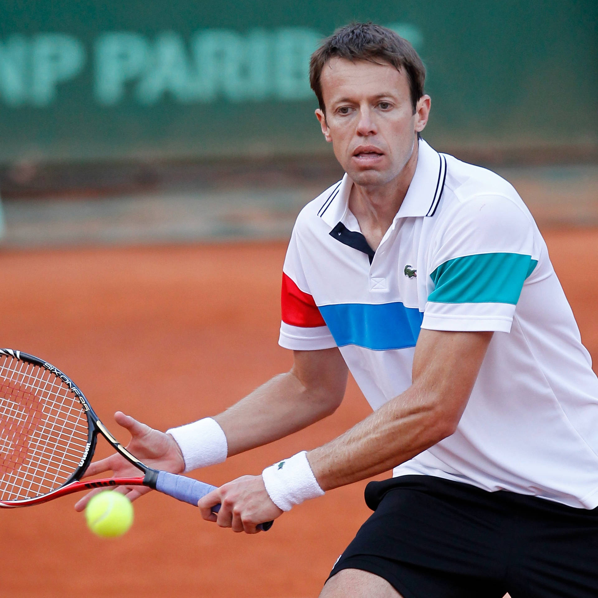 Daniel Nestor Targeting Ball Background