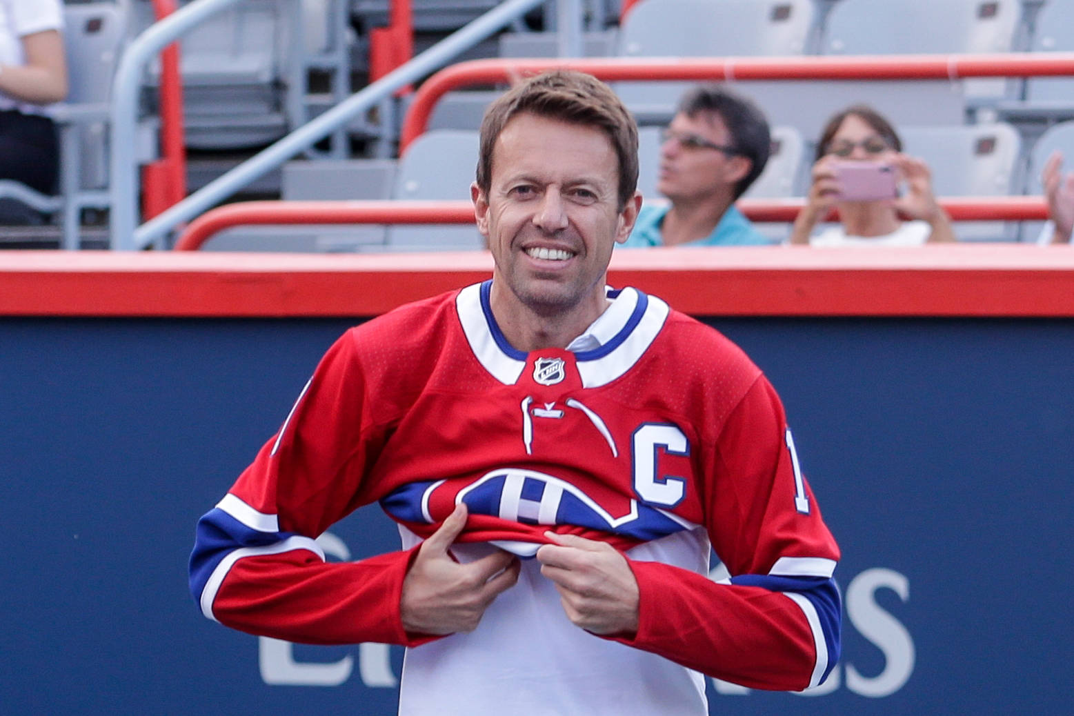 Daniel Nestor Wearing Sports Jersey