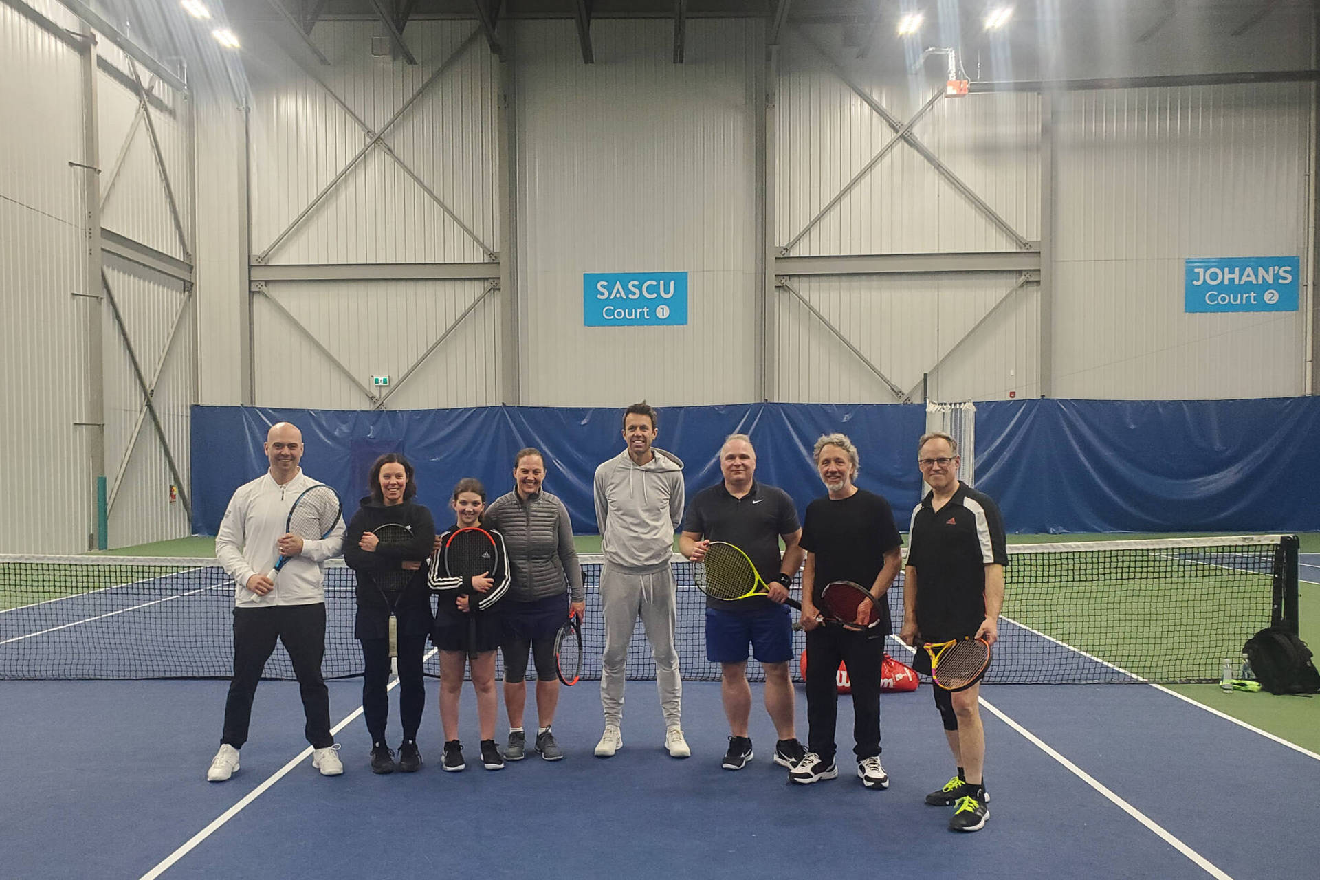 Daniel Nestor With Fans And Players Background