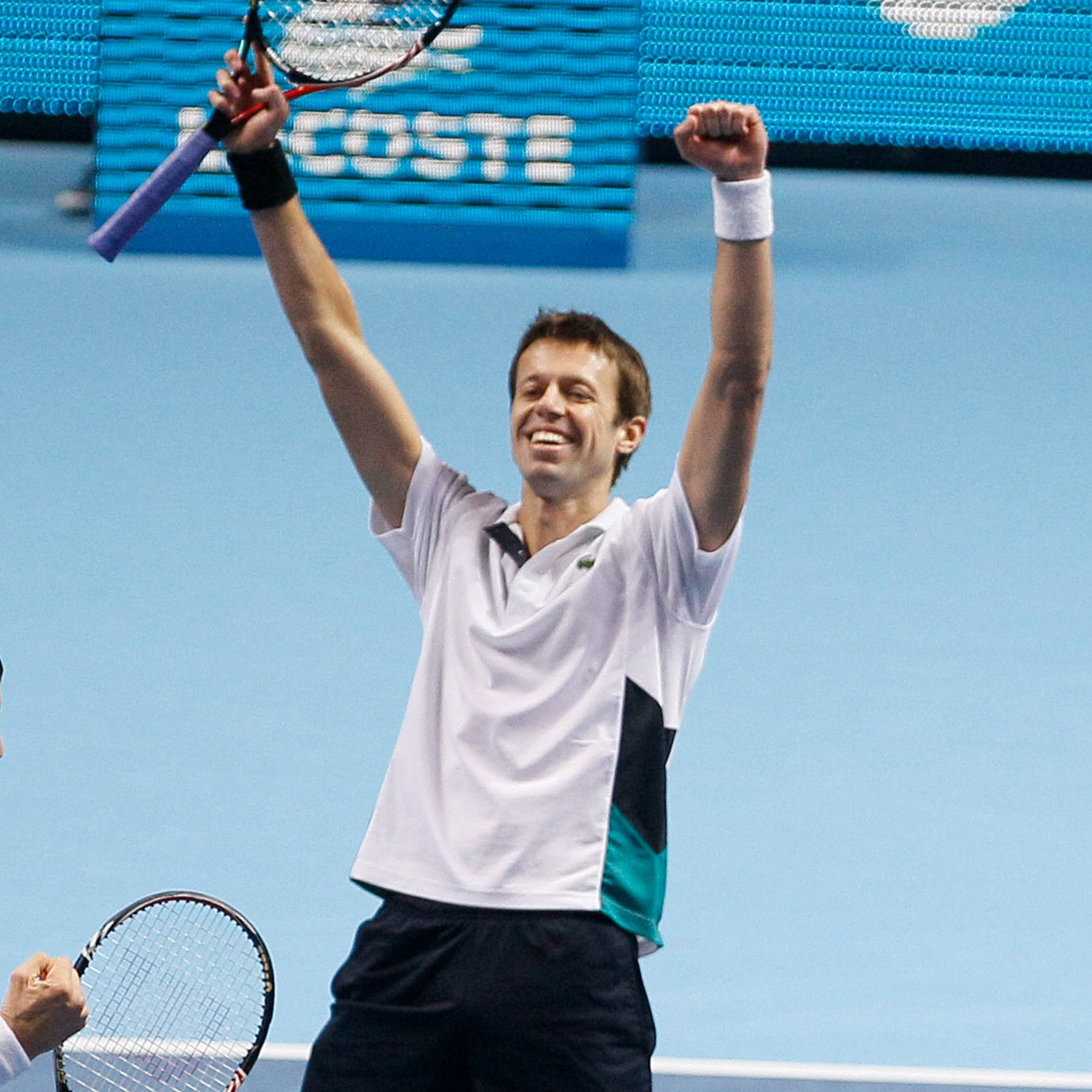 Daniel Nestor With Raised Arms Background