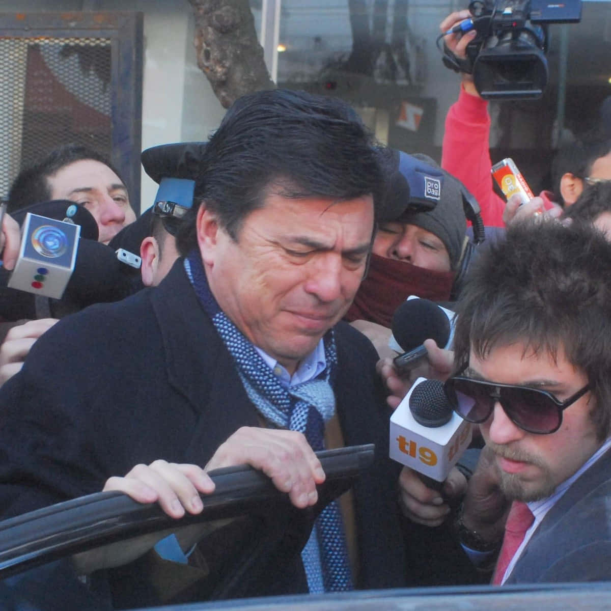 Daniel Passarella Surrounded By Press Background