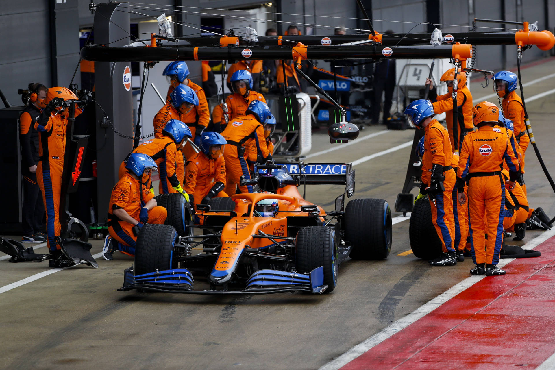 Daniel Ricciardo F1 Car At Pit Stop Background