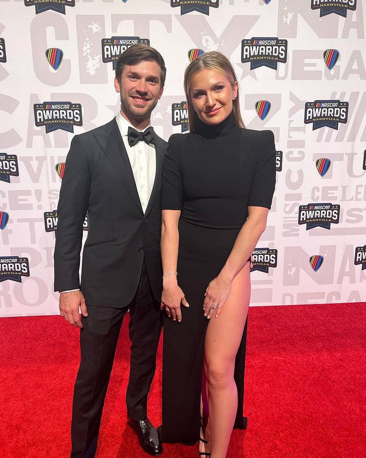 Daniel Suarez And His Wife Dressed In Black