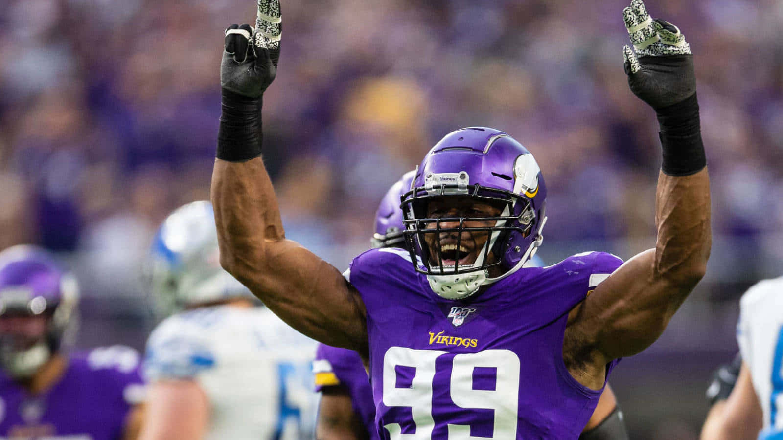 Danielle Hunter Raise Hands Celebrate Win Background