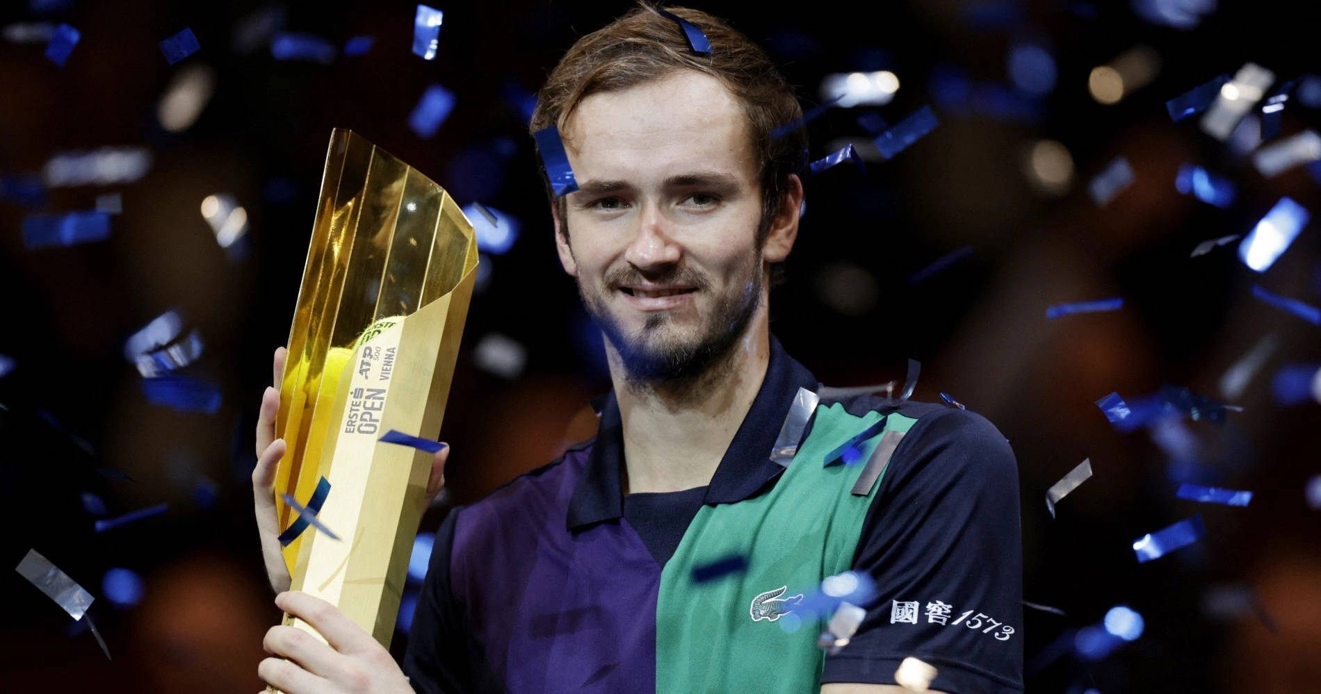 Daniil Medvedev Showered With Confetti Background