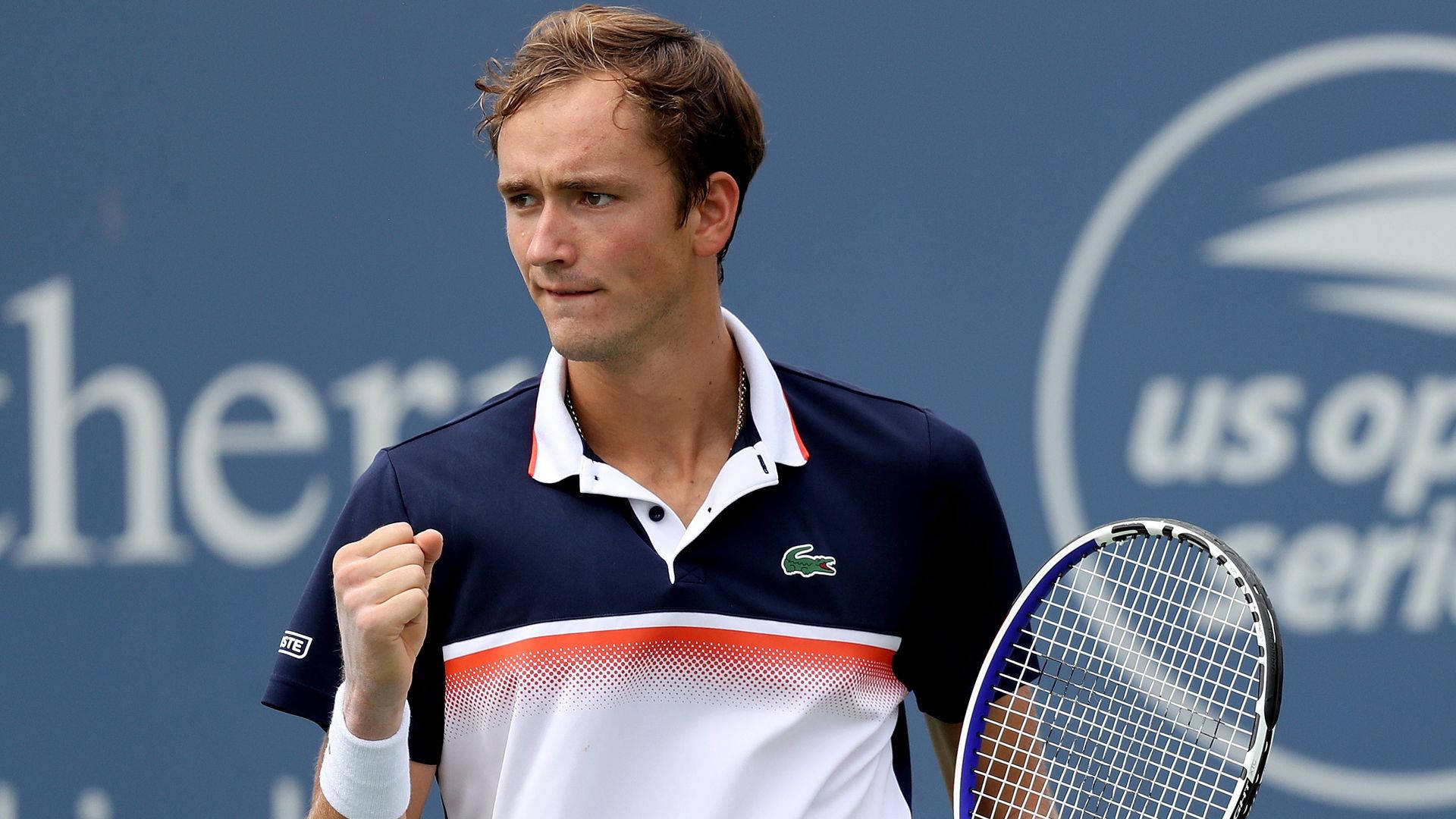 Daniil Medvedev Triumphantly Clenching Fist After A Win Background