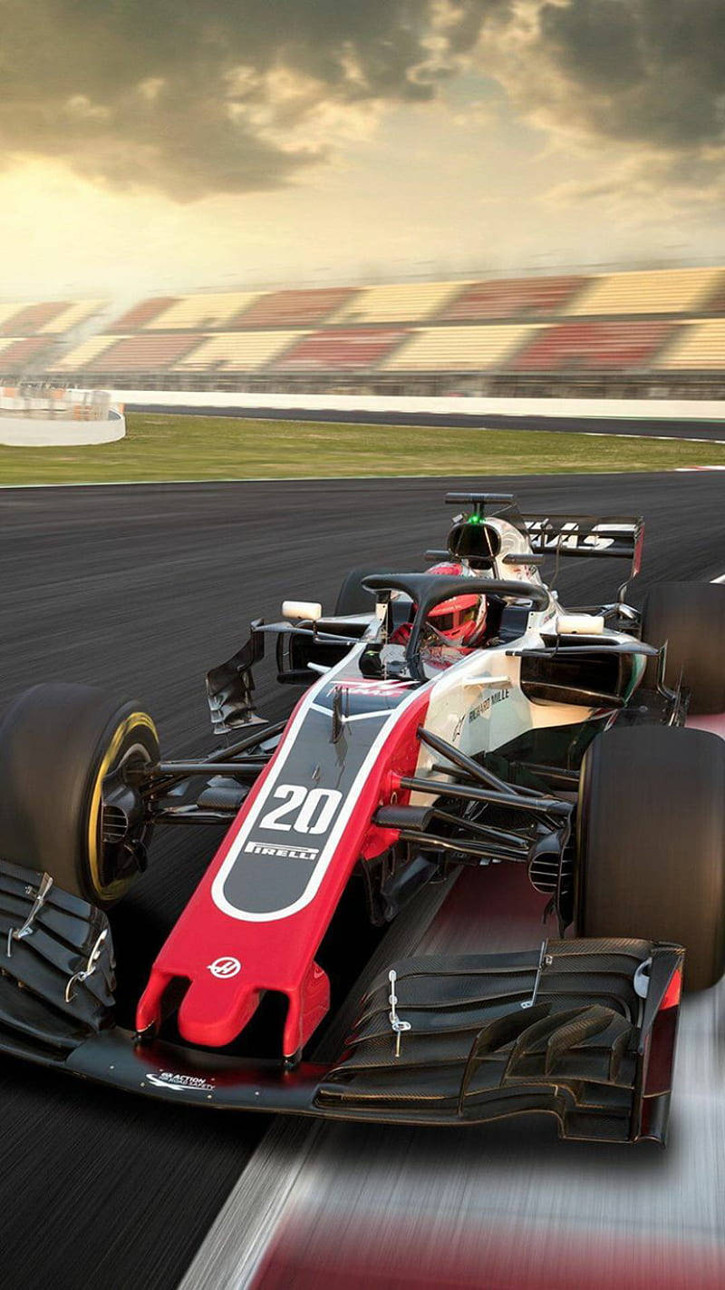 Danish Racing Prodigy, Kevin Magnussen, Dominating The Track Background