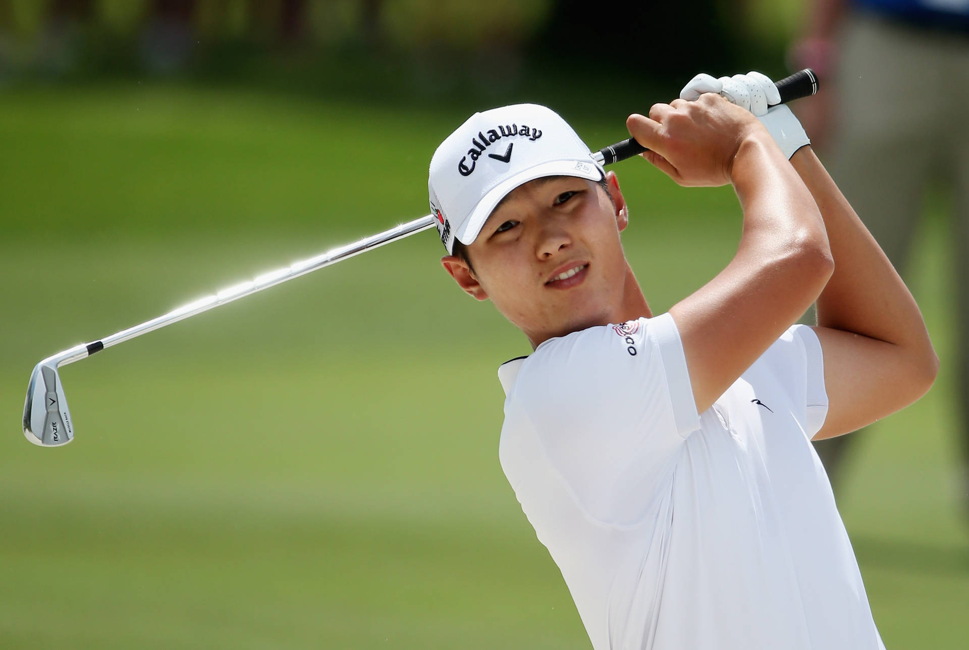 Danny Lee In Full White Outfit Background