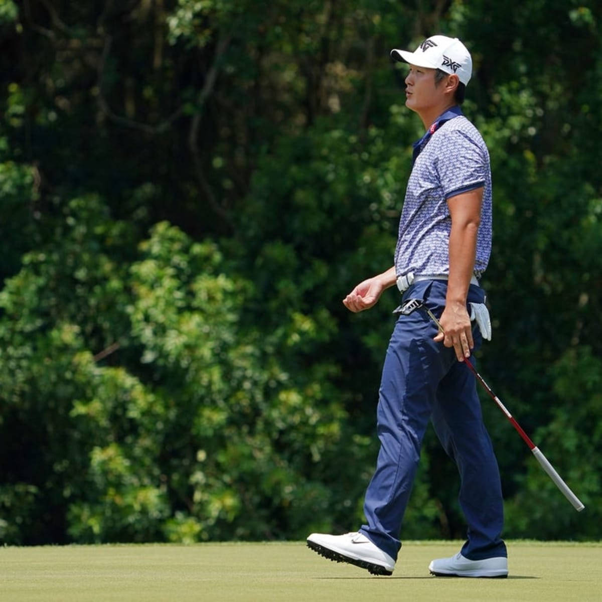 Danny Lee Walking On A Course Background