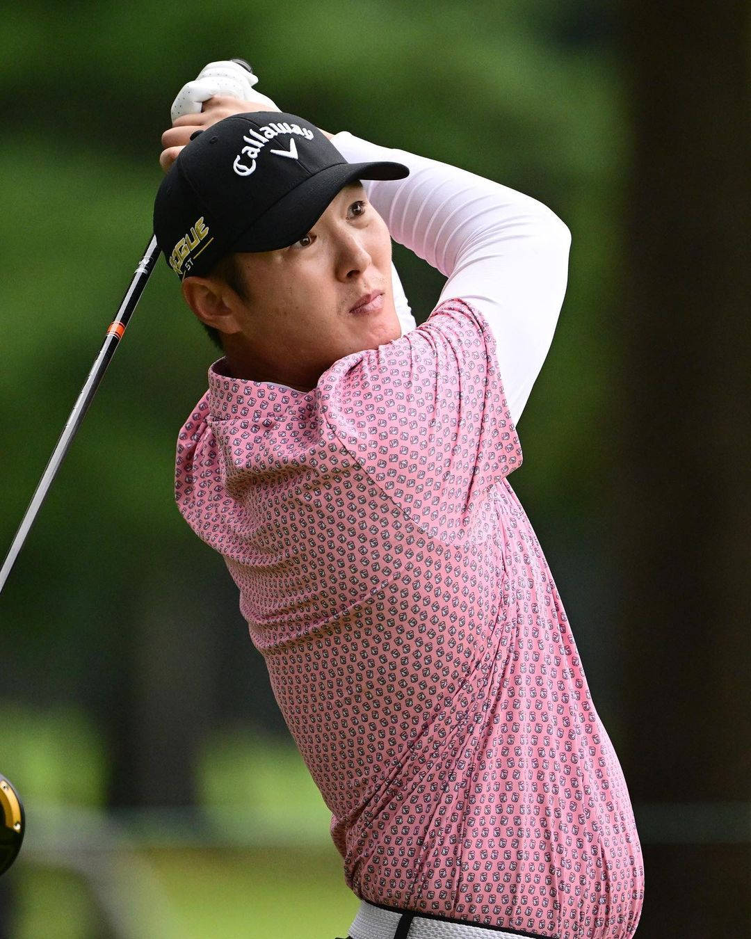 Danny Lee Wearing Pink Shirt Background