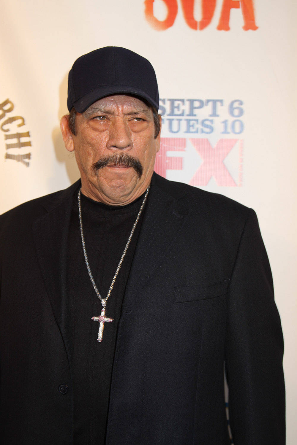 Danny Trejo Fierce Look In Black Background