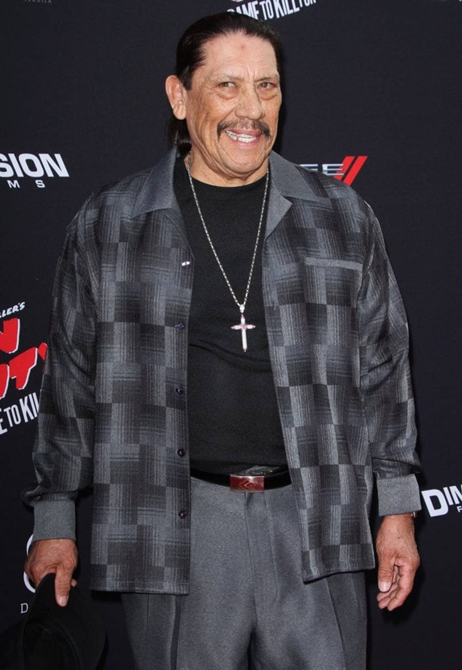 Danny Trejo In Check Pattern Suit Background