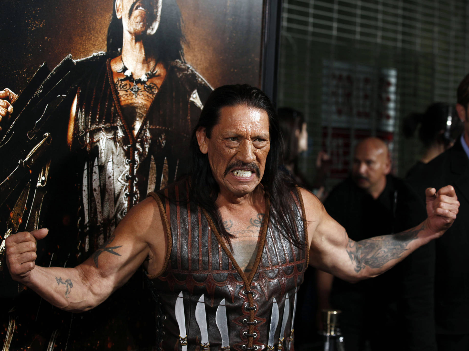 Danny Trejo Powerfully Flexing Muscles In Machete Film Event