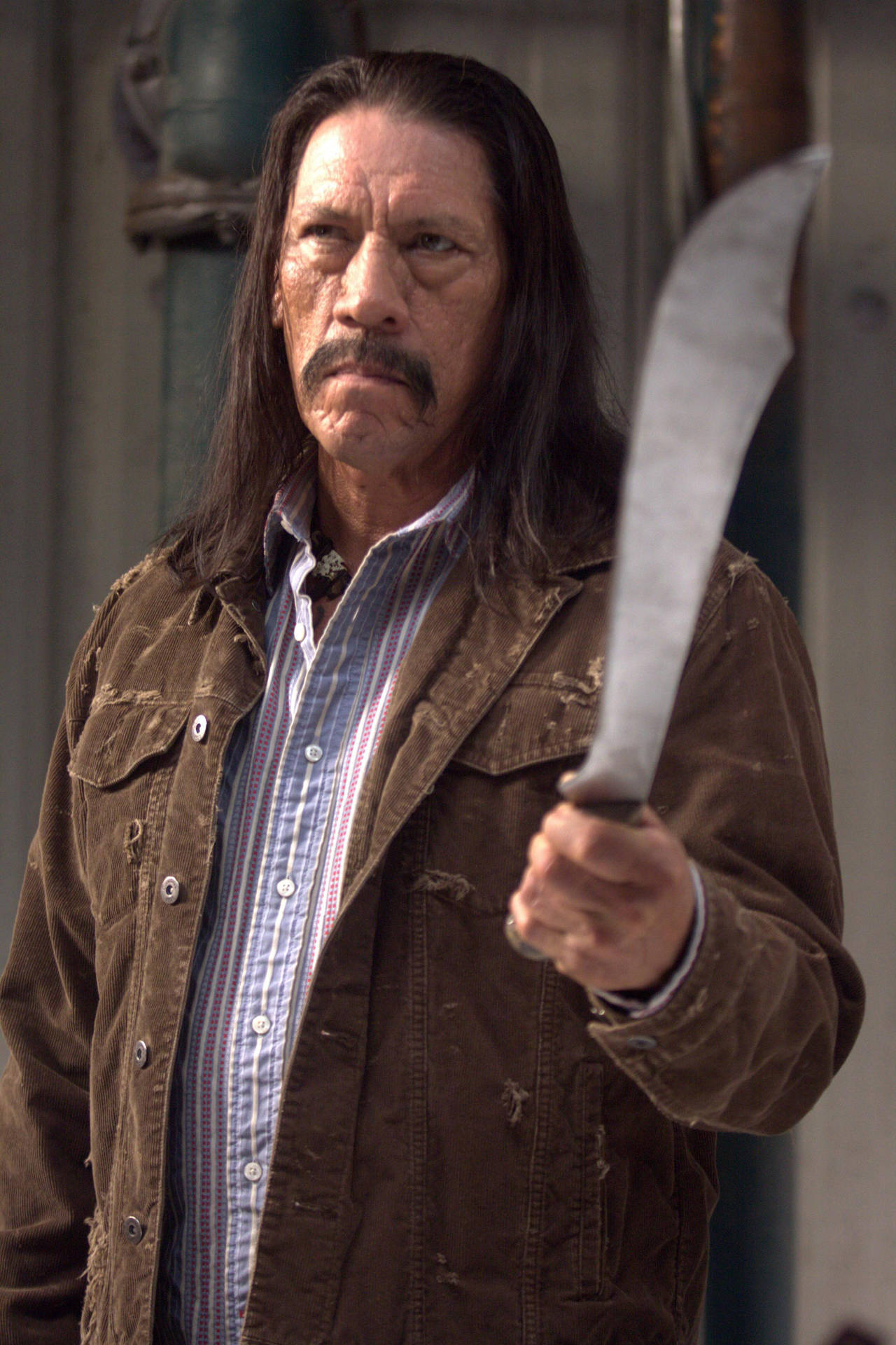 Danny Trejo With A Sharp Machete Background