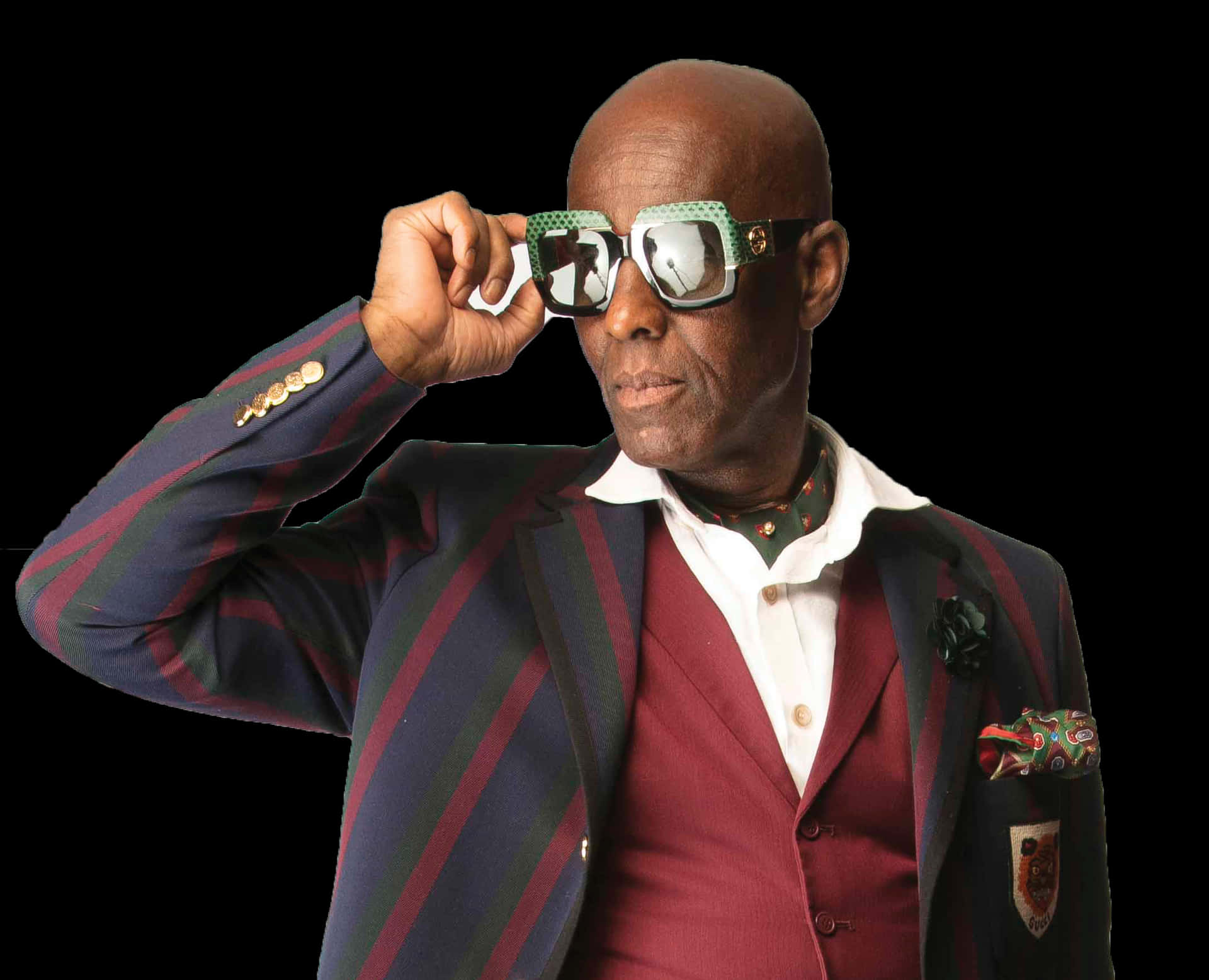 Dapper Dan Holding His Signature Sunglasses Background