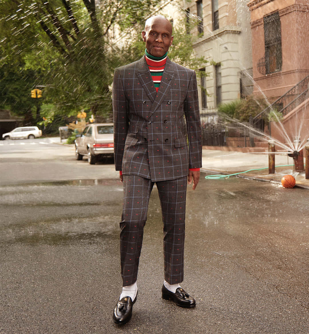 Dapper Dan In A Tailored Suit Background