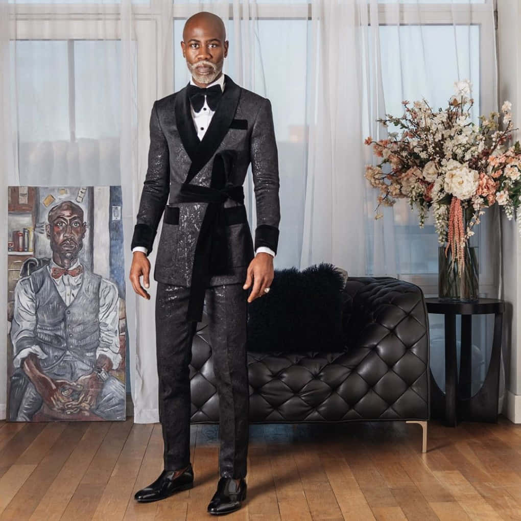 Dapper Man Wearing Jacket Tuxedo Background