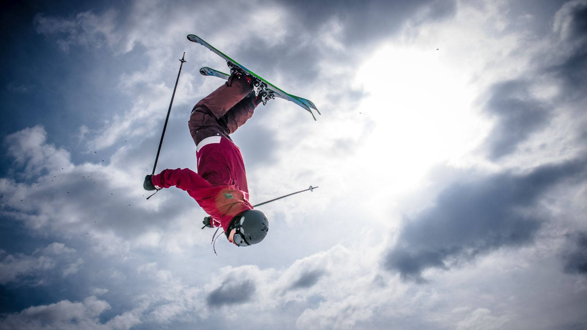 Daredevil Ski Jumper Performing A High-flying Backflip