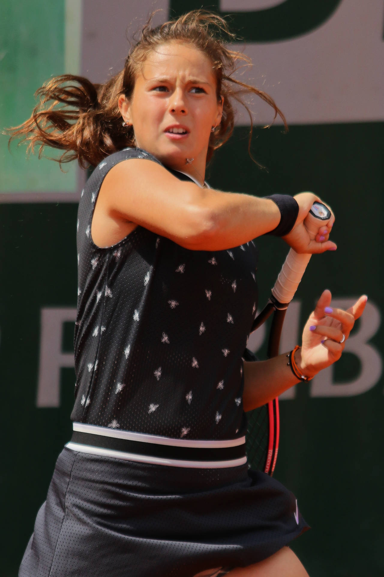 Daria Kasatkina Makes A Mighty Swing Background