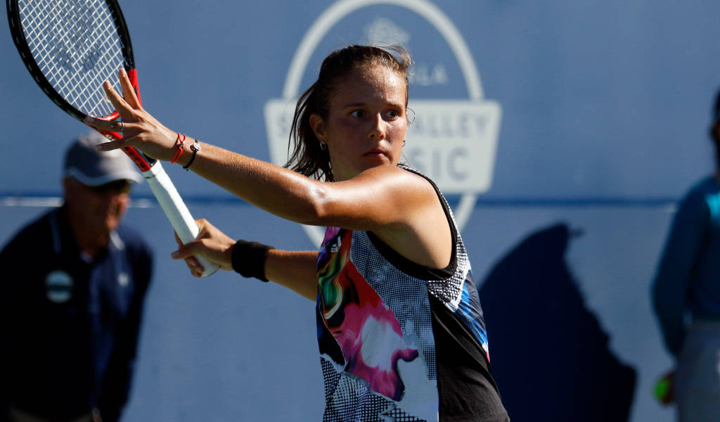 Daria Kasatkina Takes Aim With Racket Background