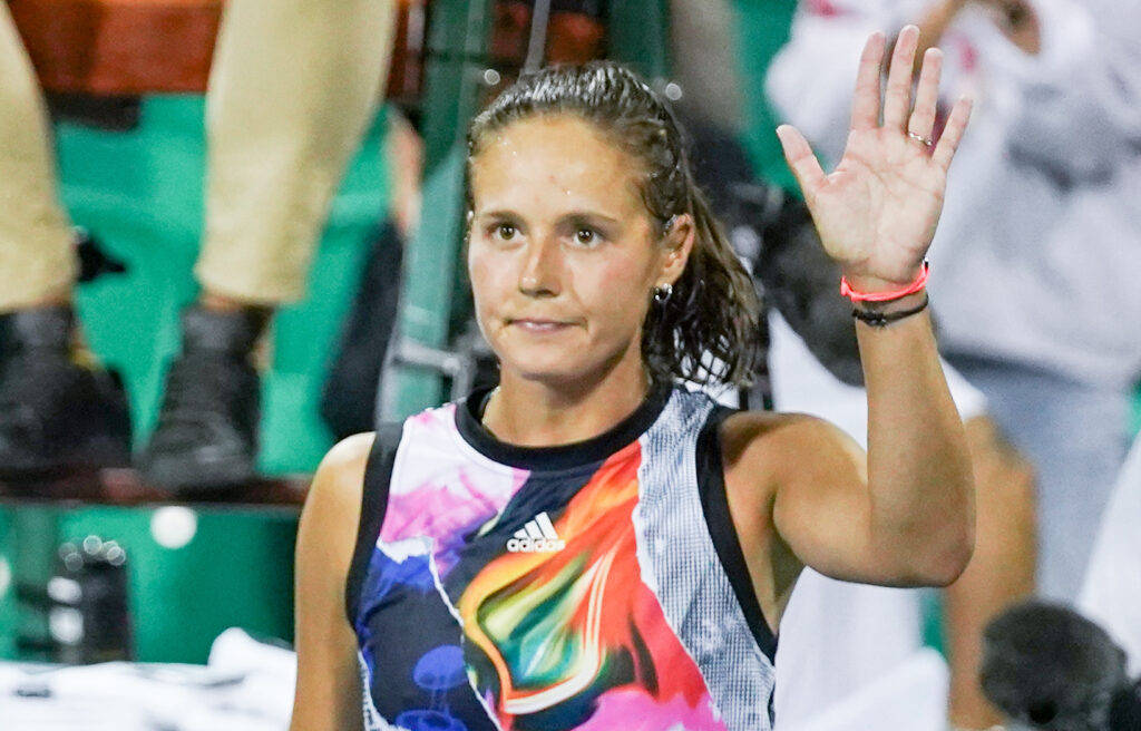 Daria Kasatkina Waving In Colorful Shirt Background