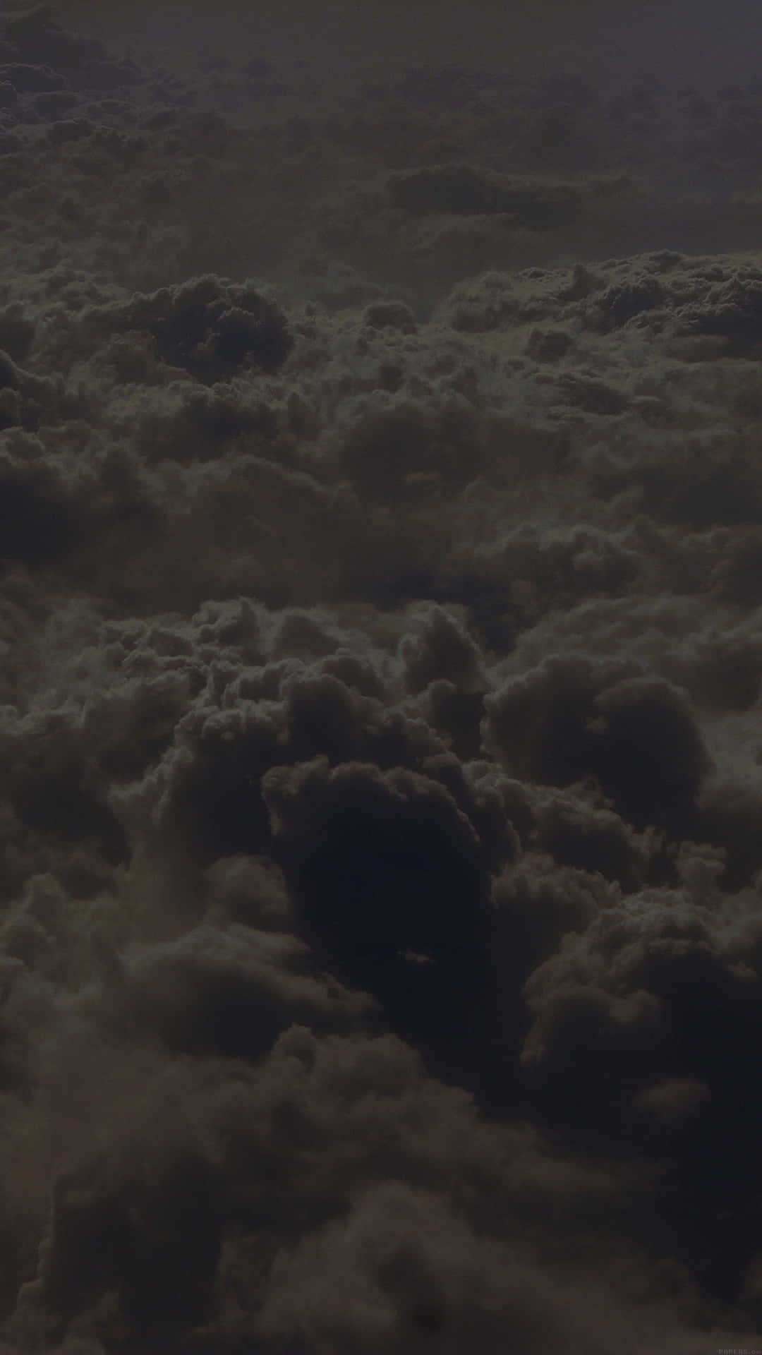 Dark And Menacing Black Clouds Above The Horizon. Background