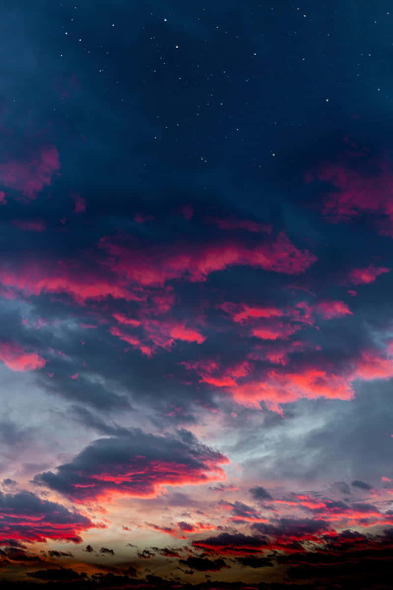 Dark Blue Pink Sunset Clouds Background