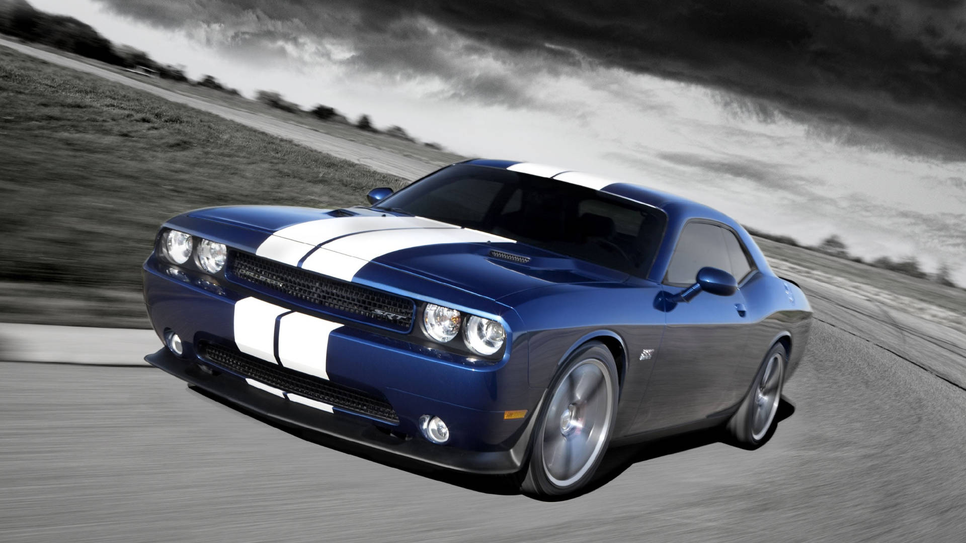 Dark Clouds Above Blue Dodge Challenger Background