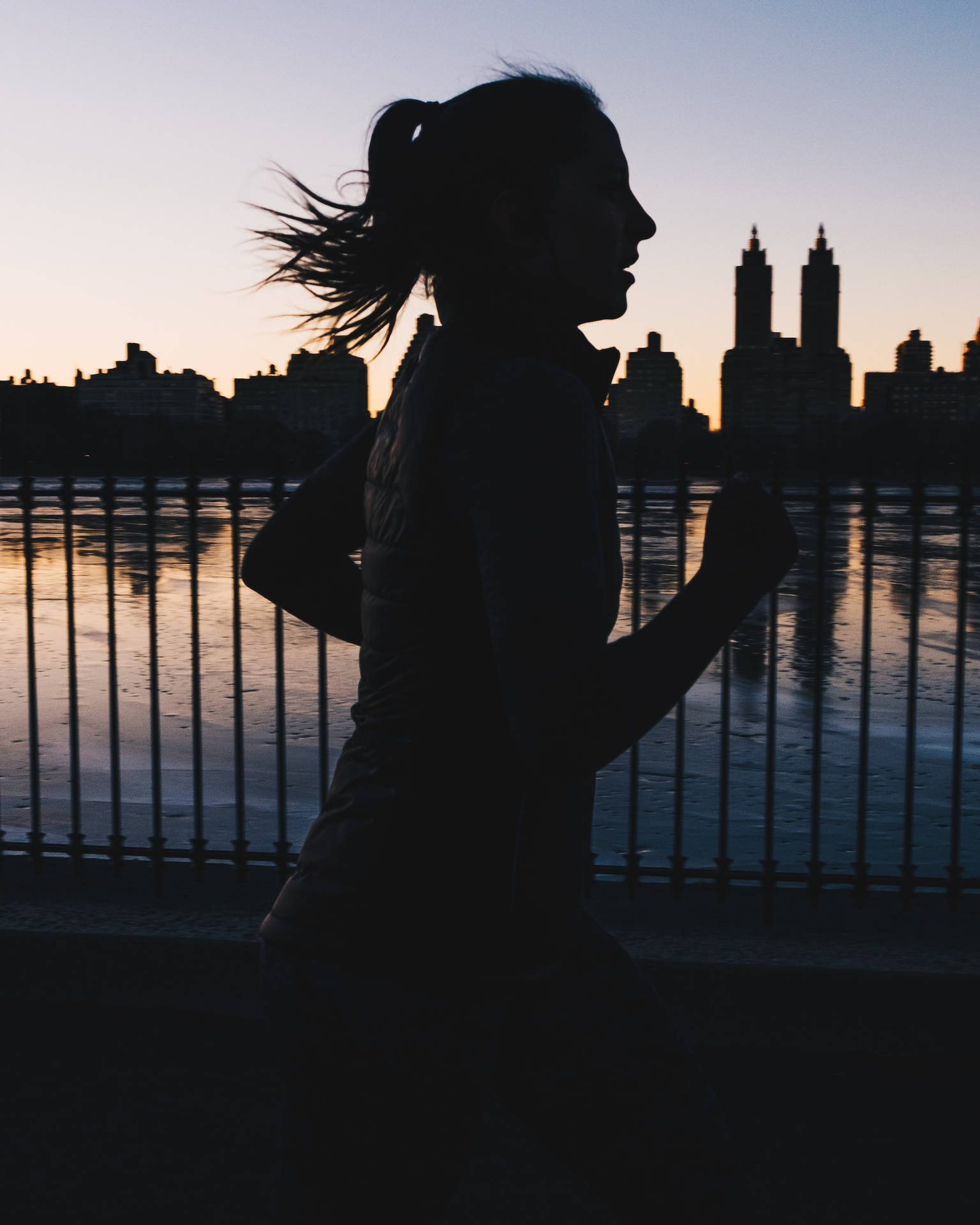 Dark Girl Jogging In City