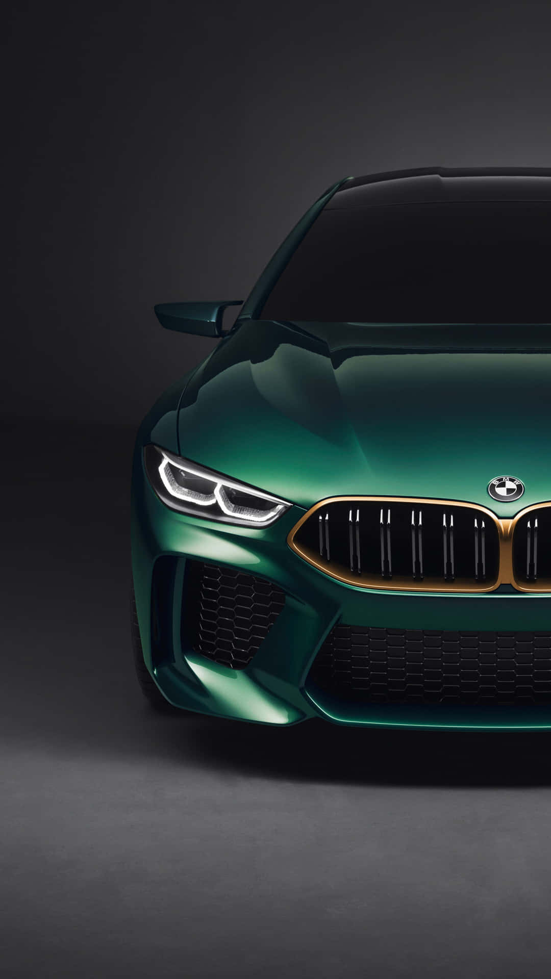 Dark Green Bmw M8 Half-view 4k Mobile Background