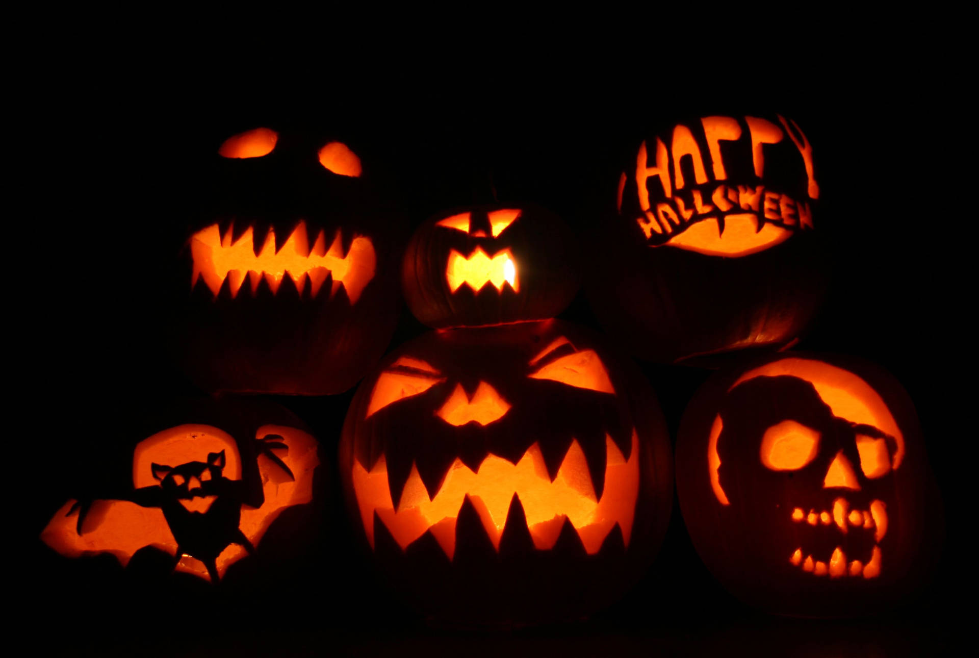 Dark Halloween Pumpkins Pile Background