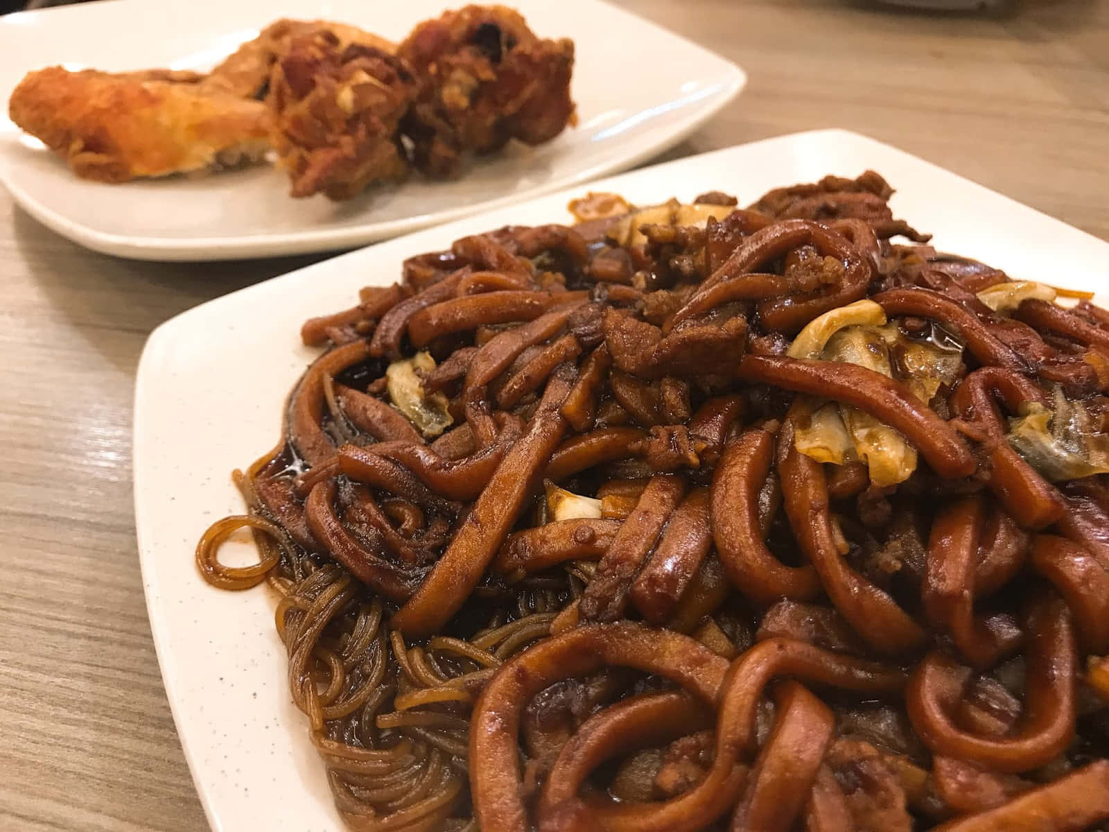 Dark Hokkien Mee With Fried Chicken Background