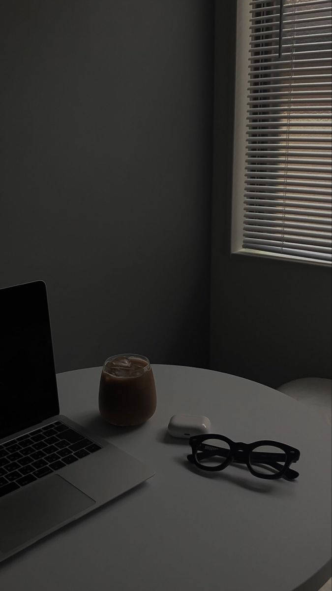 Dark Iphone Desk With Glasses