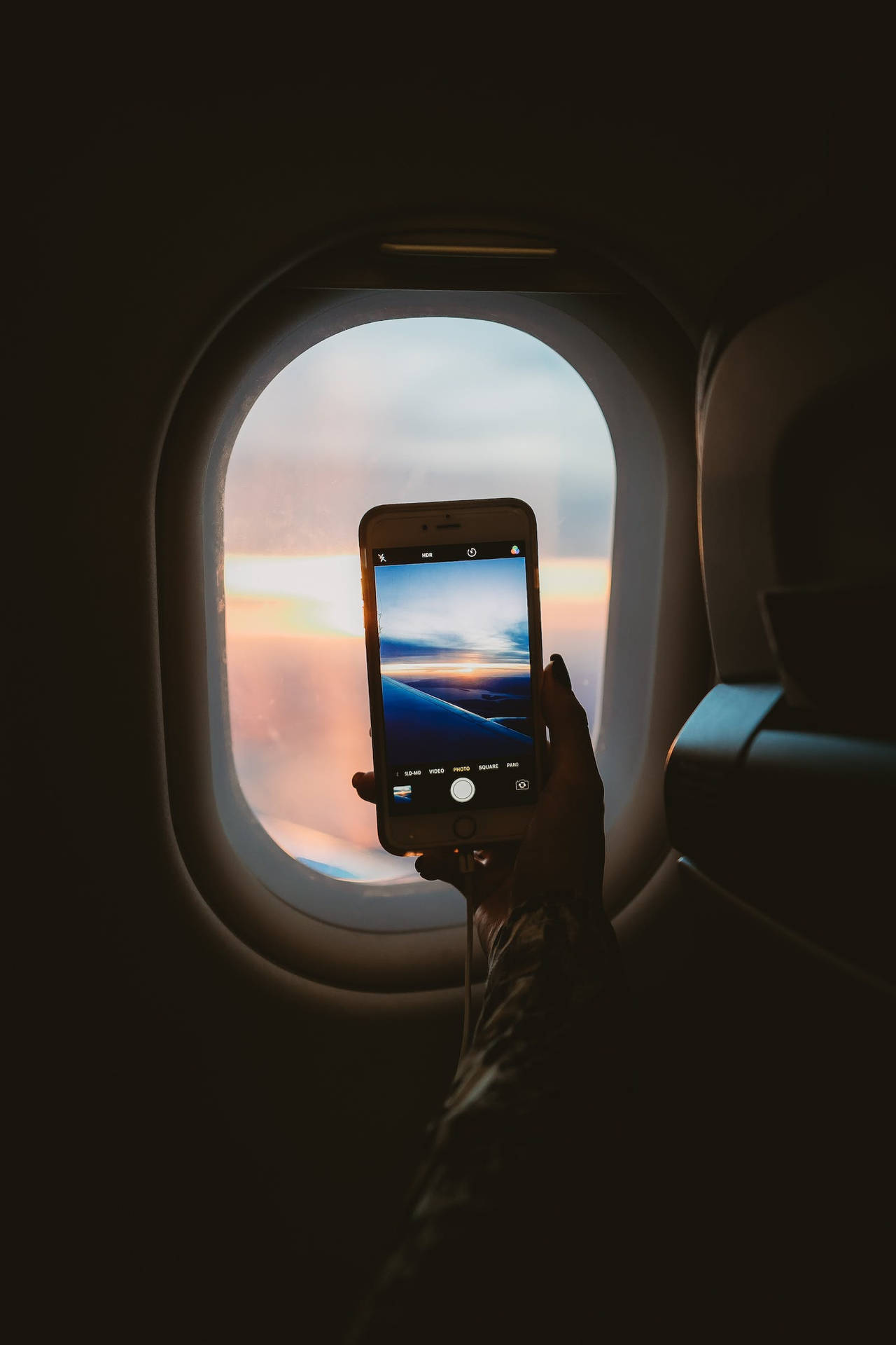Dark Iphone On The Plane Background