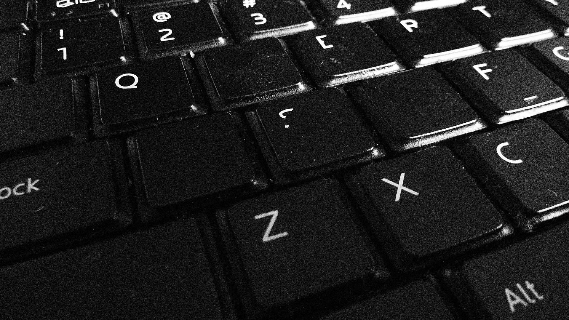 Dark Laptop Keyboard Keys Background