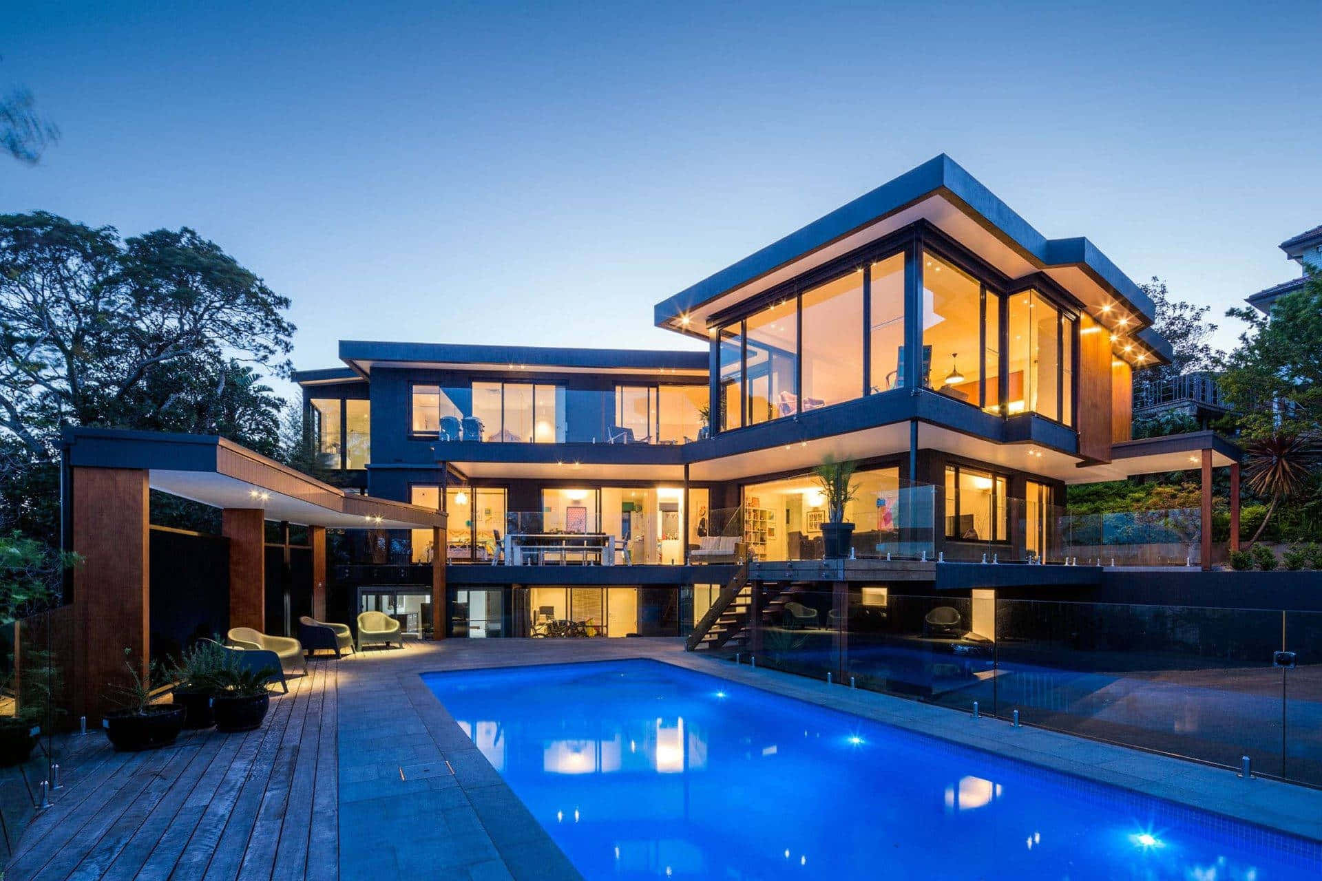 Dark Luxury House And Tall Glass Windows