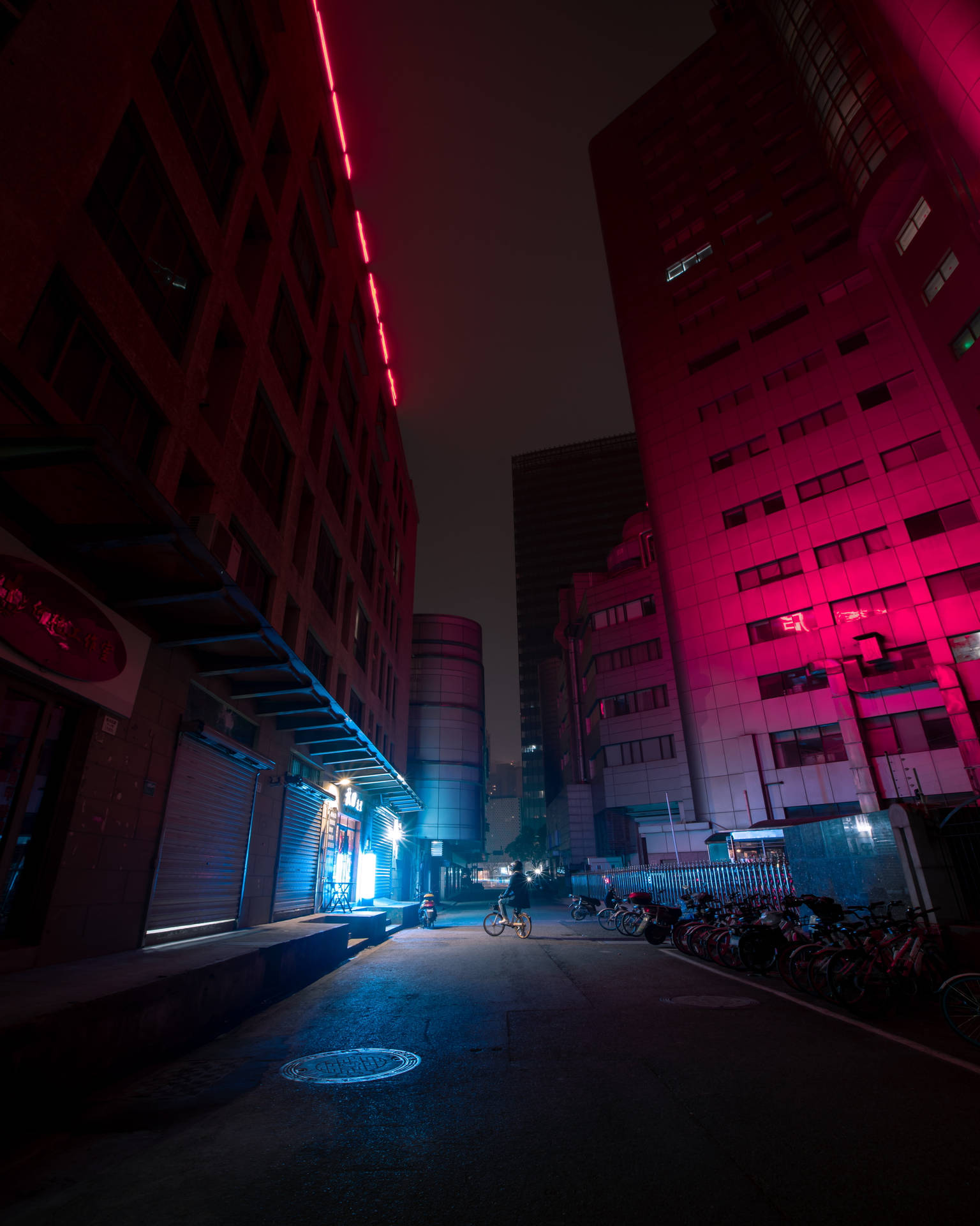 Dark Neon Street With Bicycles Background