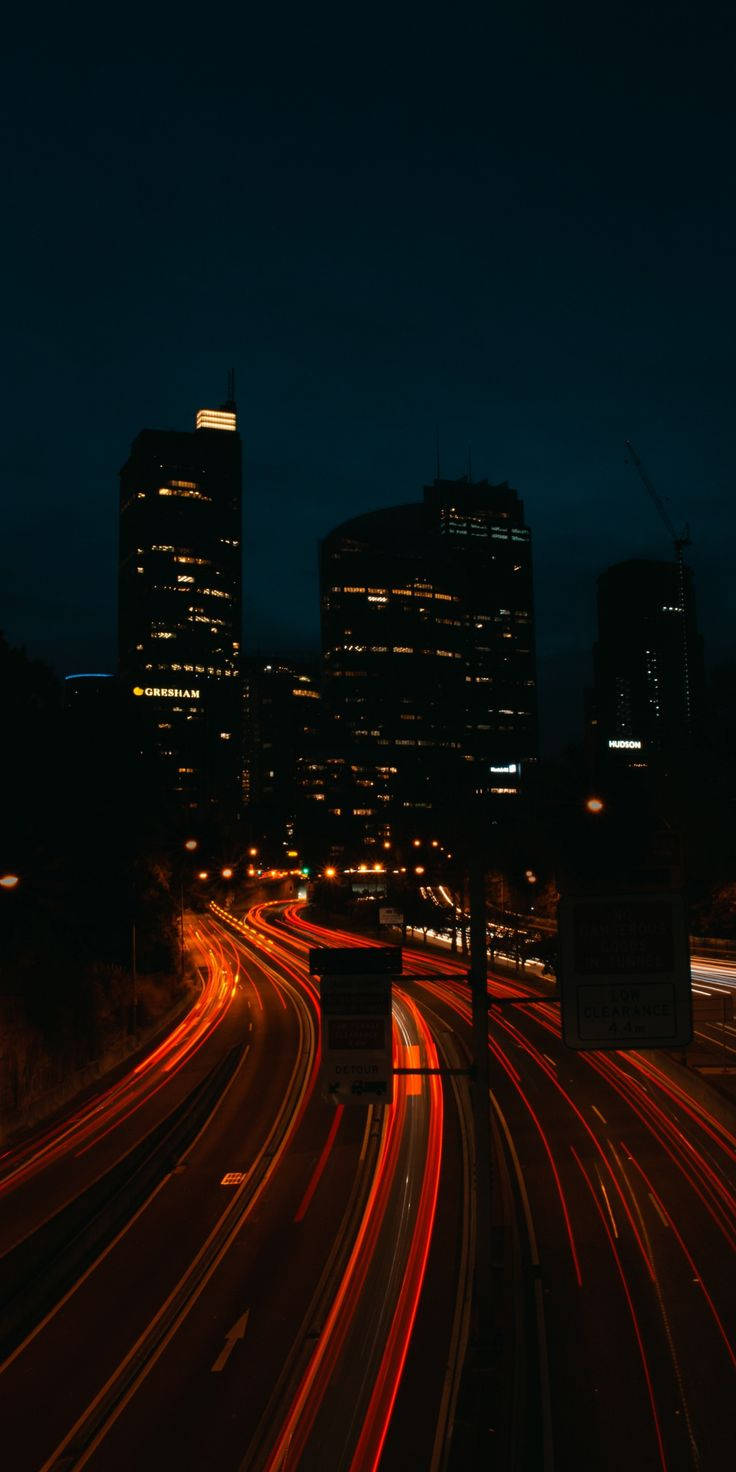 Dark Night And Busy Highway Background