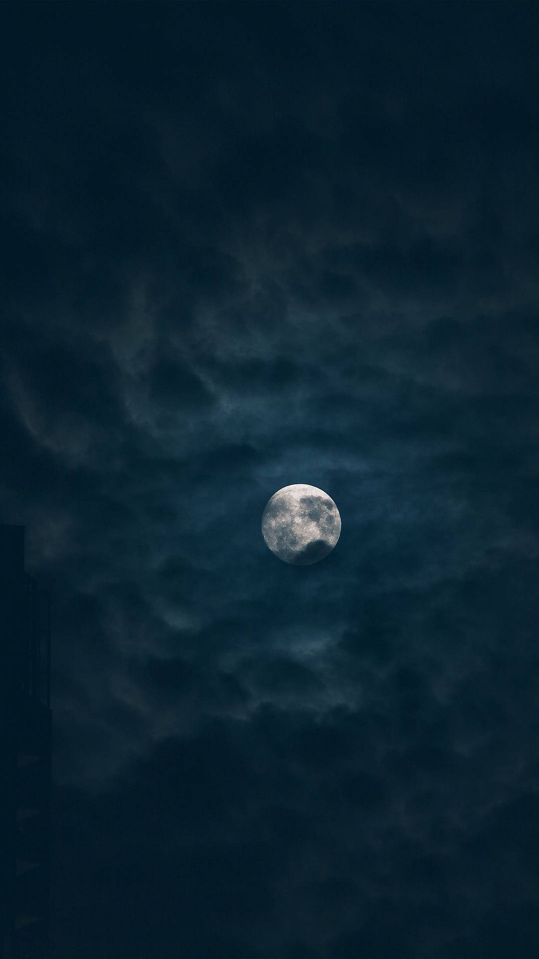 Dark Night Moon Covered In Clouds