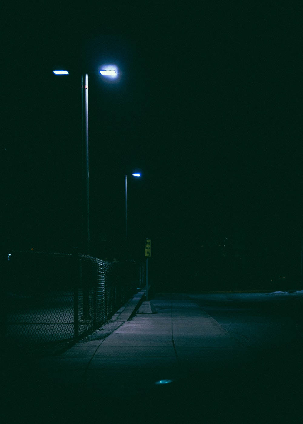 Dark Night Sidewalk With Light