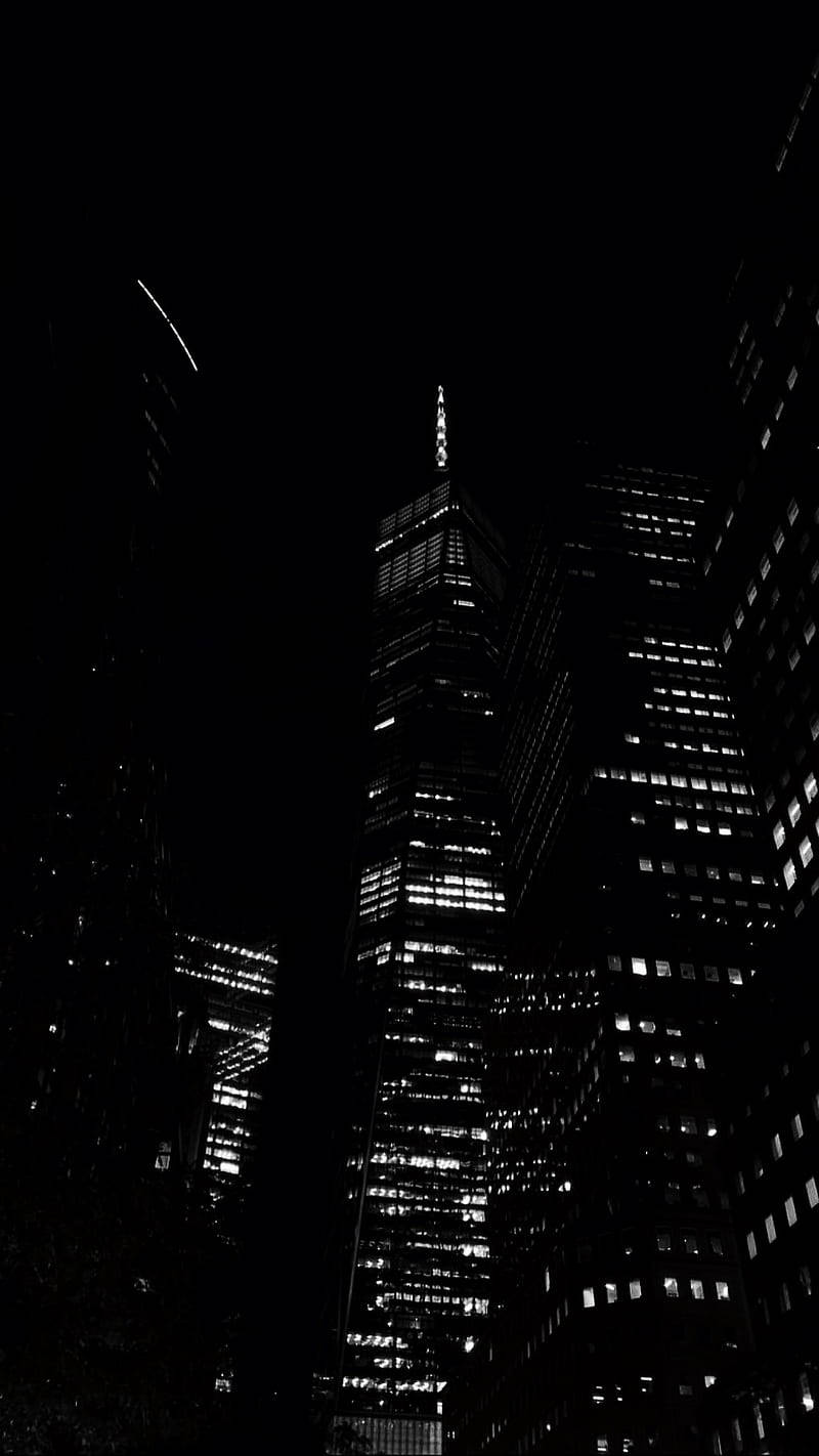 Dark Night View Of Tall Buildings Background
